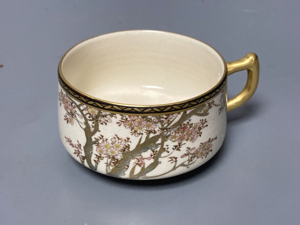 A Japanese satsuma vase, a tea cup and saucer and another vase, tallest 37cm